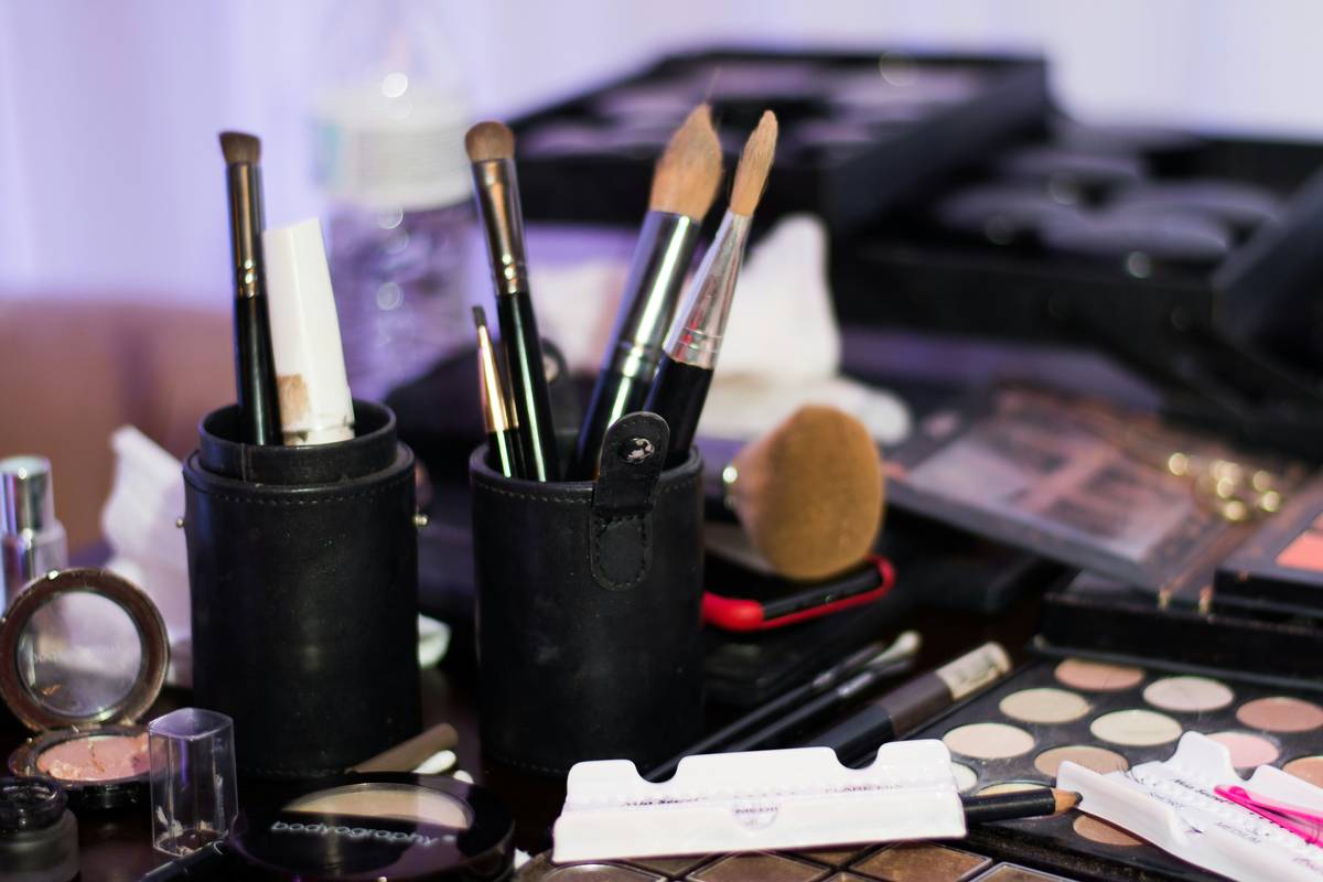 makeup travel case with compartments for brushes, palettes, and liquids securely organized